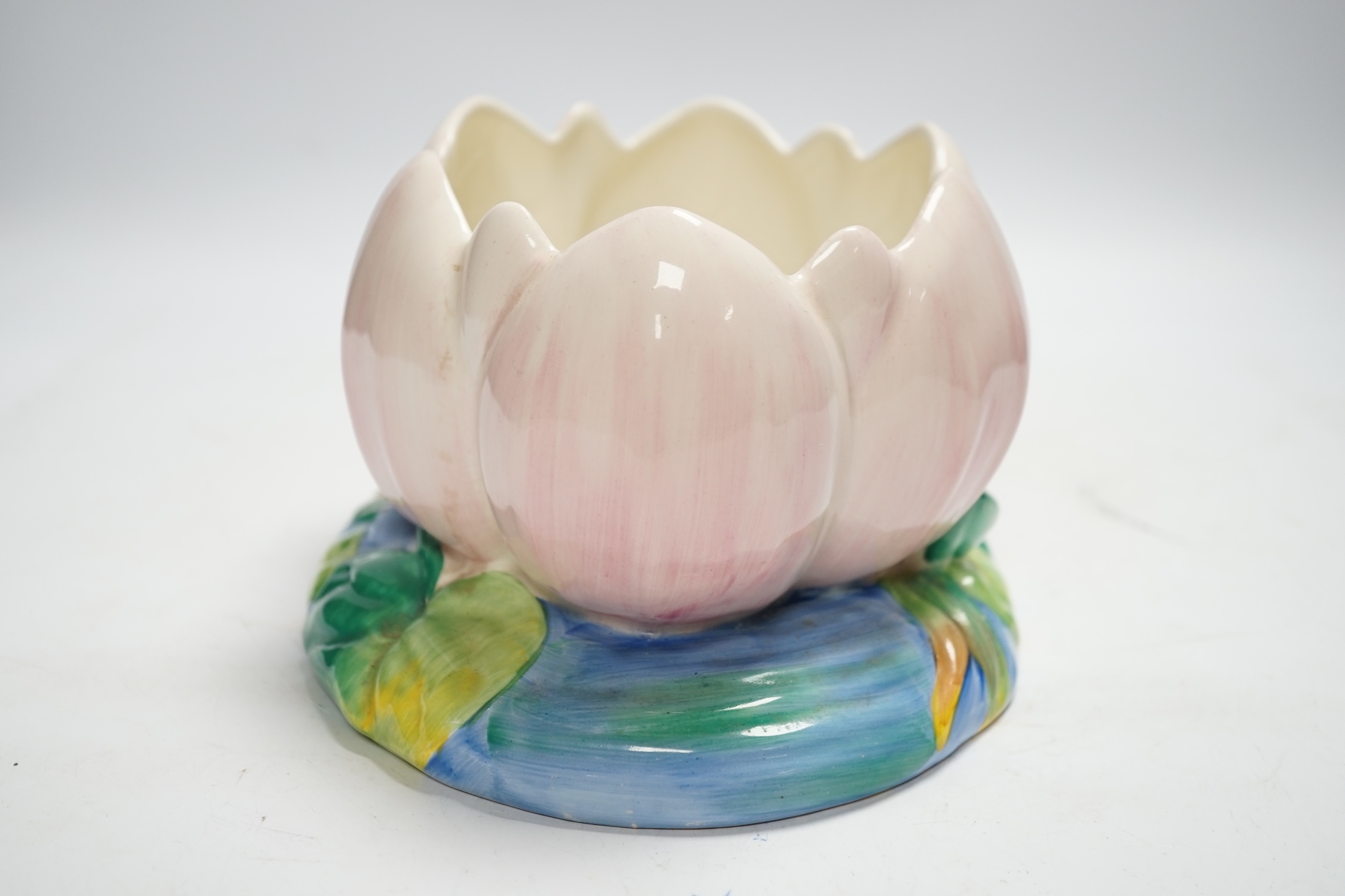 A Newport Pottery Clarice Cliff Lilypad vase, 22cm wide at base (a.f.)